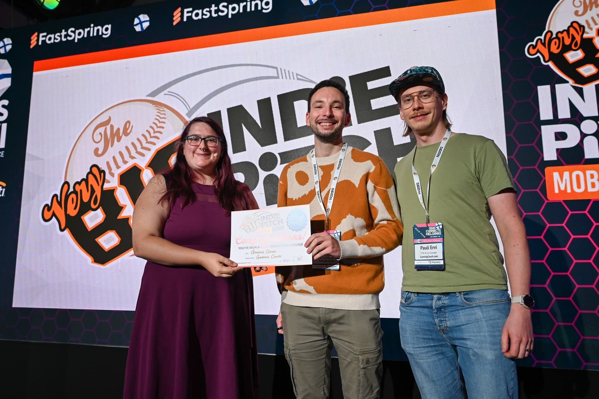 The Gaming Couch team on stage accepting 2nd place at The Very Big Indie Pitch in Helsinki
